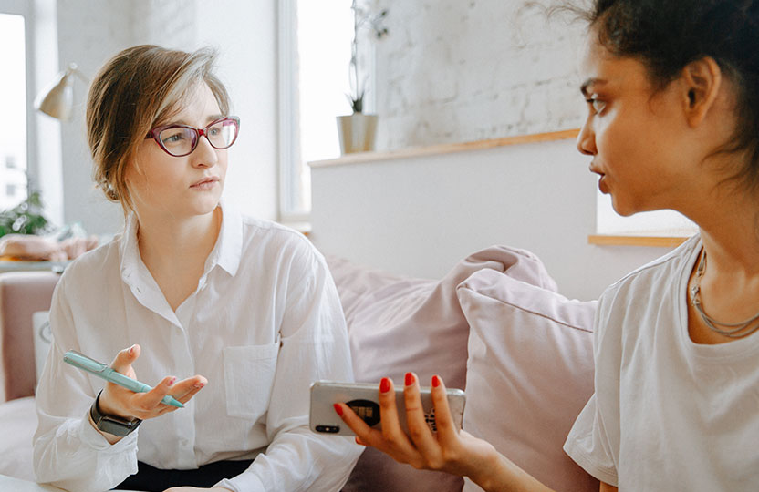 Two girls talking